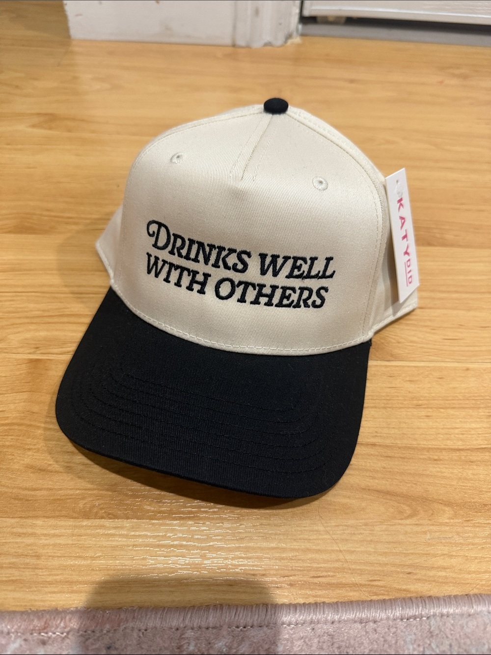 Black and Cream Drinks well with other snap back trucker hat